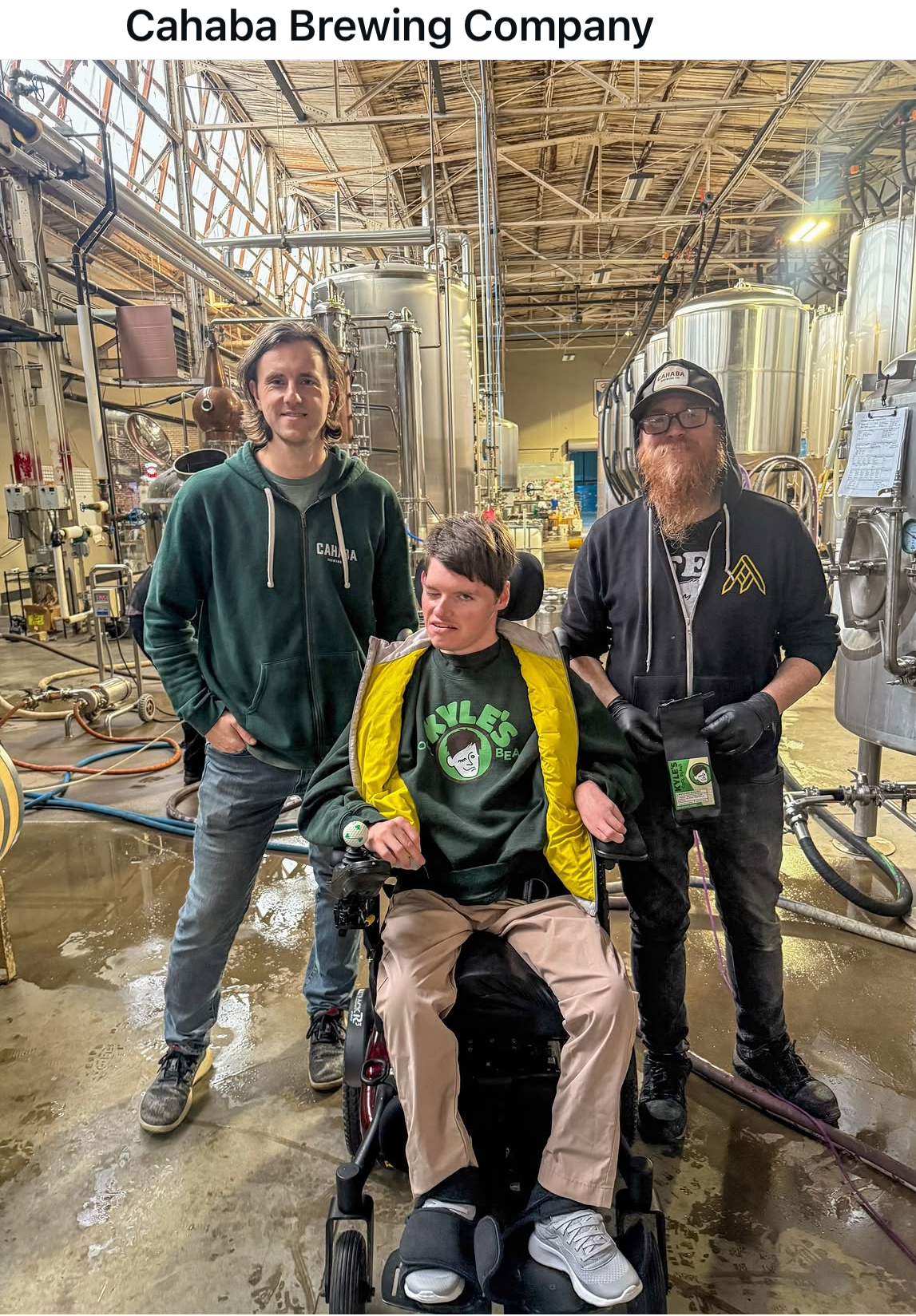 Three people in a brewery setting with 'Cahaba Brewing Company' text above.
